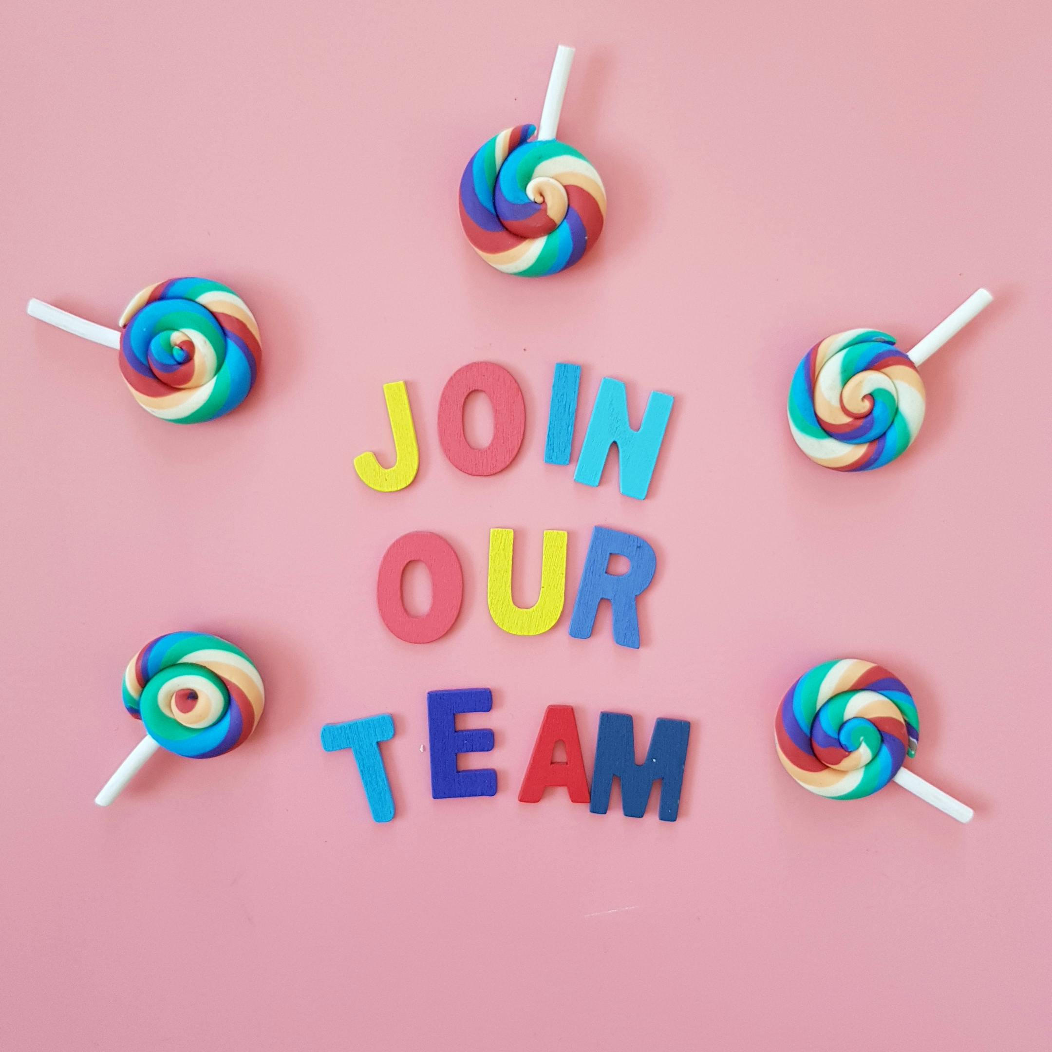 Join our team, with lollipops around the words